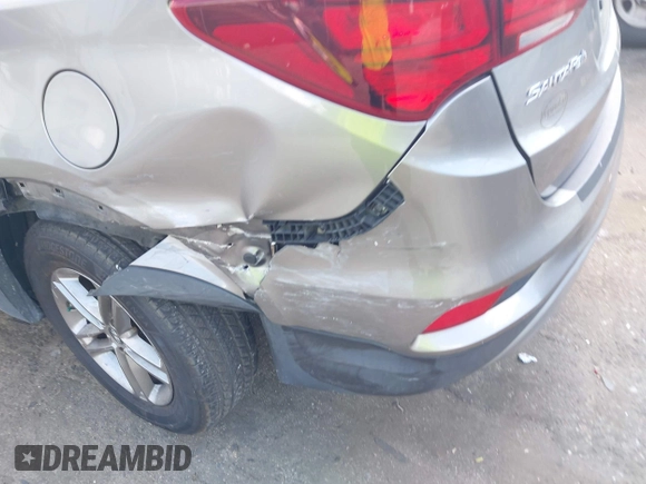 2017 Hyundai Santa Fe 2.4L z VIN 5NMZU3LB7HH025791, wystawiony jako IAAI lot #42277964 z przebiegiem 154 110 mil mil oraz . Historia ofert i sprzedaży dostępna na DreamBid. Obrazek 6.
