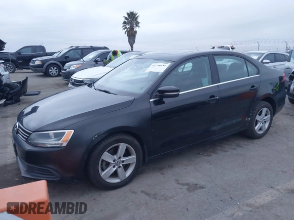 2013 Volkswagen Jetta TDI w/Premium/Nav with VIN 3VWLL7AJ4DM248448, listed as a IAAI auction lot 41749189 with 85,933 mi miles and . Bid and sale history available at DreamBid. Image 2.