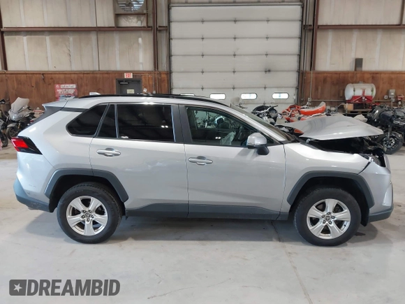2021 Toyota RAV4 XLE with VIN 2T3P1RFV5MC180890, listed as a IAAI auction lot 42567858 with 56,961 mi miles and . Bid and sale history available at DreamBid. Image 12.
