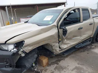 2024 Chevrolet Colorado 4WD Trail Boss with VIN 1GCPTEEK2R1155752, listed as a IAAI auction lot 42211659 with 28,428 mi miles and . Bid and sale history available at DreamBid. Image 6.
