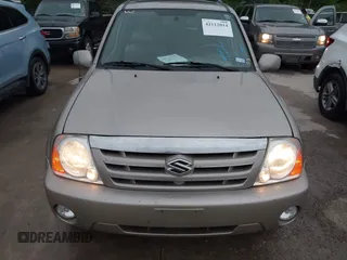 2004 Suzuki XL-7 LX with VIN JS3TX92V244114426, listed as a IAAI auction lot 42112014 with 169,377 mi miles. Bid and sale history available at carsss.com. Image 6.