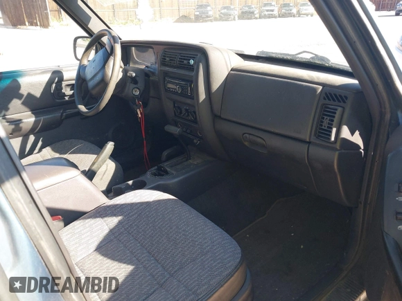 1999 Jeep Cherokee Sport with VIN 1J4FF68S7XL541101, listed as a IAAI auction lot 42518775 with 213,762 mi miles and . Bid and sale history available at DreamBid. Image 5.