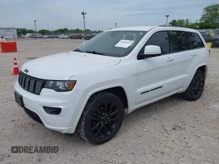 2018 Jeep Grand Cherokee Altitude with VIN 1C4RJFAG6JC164906, listed as a IAAI auction lot 42302611 with 81,447 mi miles and . Bid and sale history available at DreamBid. Image 2.