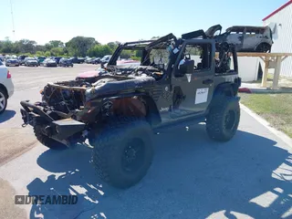 2020 Jeep Wrangler Sport S with VIN 1C4GJXAG6LW189187, listed as a IAAI auction lot 40280437 with Not provided miles and . Bid and sale history available at DreamBid. Image 2.