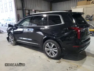 2023 Cadillac XT6 AWD Premium Luxury with VIN 1GYKPFRS3PZ121942, listed as a Copart auction lot 46489545 with 35,453 mi miles and Salvage Title. Bid and sale history available at carsss.com. Image 2.
