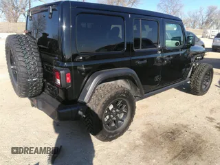 2024 Jeep Wrangler Sport S with VIN 1C4PJXDG3RW266909, listed as a IAAI auction lot 41242792 with 6,132 mi miles and . Bid and sale history available at DreamBid. Image 4.