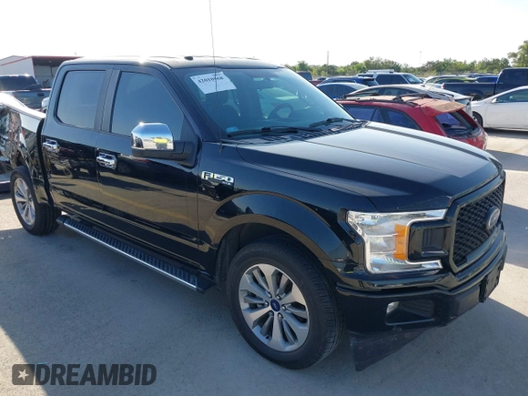 2018 Ford F-150 XL with VIN 1FTEW1C58JKC02382, listed as a IAAI auction lot 42010568 with 124,757 mi miles and . Bid and sale history available at DreamBid. Image 1.