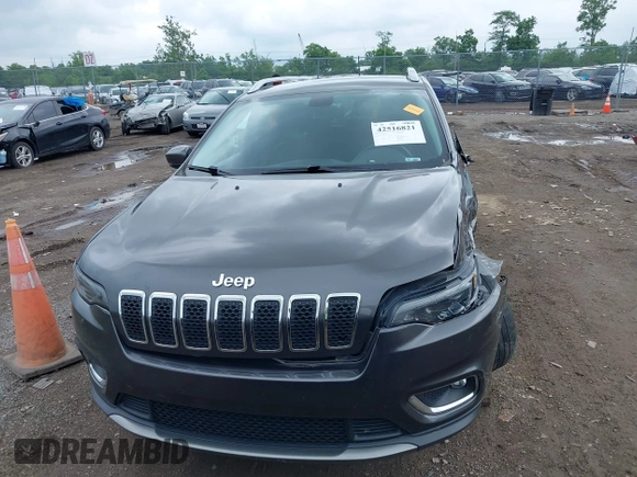2020 Jeep Cherokee Limited z VIN 1C4PJLDB8LD653312, wystawiony jako IAAI lot #42516821 z przebiegiem 146 870 mil mil oraz . Historia ofert i sprzedaży dostępna na DreamBid. Obrazek 12.