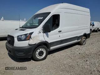 2021 Ford Transit Cargo z VIN 1FTBR1X8XMKA57008, wystawiony jako Copart lot #57188105 z przebiegiem 61 993 mil mil oraz Tytuł czysty. Historia ofert i sprzedaży dostępna na DreamBid. Obrazek 1.