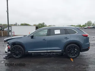 2021 Mazda CX-9 Grand Touring z VIN JM3TCBDY8M0528365, wystawiony jako IAAI lot #42222394 z przebiegiem 44 850 mil mil oraz . Historia ofert i sprzedaży dostępna na DreamBid. Obrazek 14.