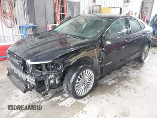 2013 Ford Fusion Titanium Hybrid with VIN 3FA6P0RU4DR281789, listed as a IAAI auction lot 41909115 with 161,008 mi miles and . Bid and sale history available at DreamBid. Image 2.