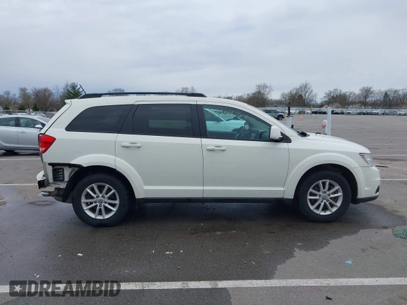 2013 Dodge Journey SXT with VIN 3C4PDCBG9DT564303, listed as a IAAI auction lot 41954764 with 132,125 mi miles. Bid and sale history available at carsss.com. Image 14.