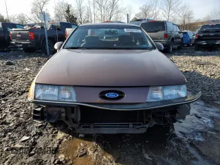 1989 Ford Taurus GL with VIN 1FABP52U1KA299938, listed as a Copart auction lot 86684144 with 52,675 mi miles and Salvage Title. Bid and sale history available at carsss.com. Image 5.