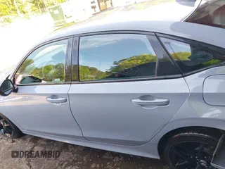 2022 Honda Civic Si with VIN 2HGFE1E52NH474042, listed as a IAAI auction lot 42099415 with 26,828 mi miles and . Bid and sale history available at DreamBid. Image 14.