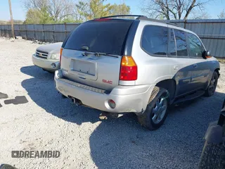 2005 GMC Envoy SLE with VIN 1GKDT13S952256293, listed as a IAAI auction lot 42048366 with 225,753 mi miles and . Bid and sale history available at DreamBid. Image 4.