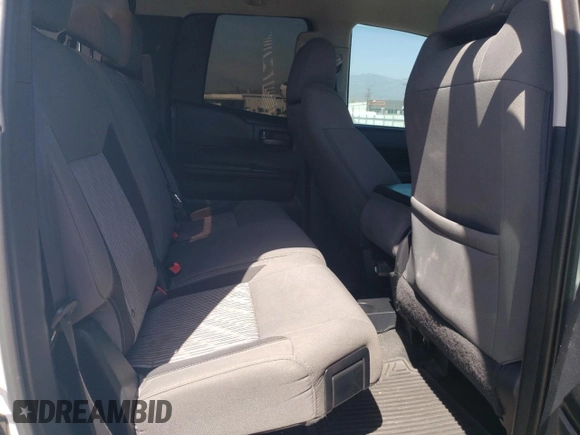 2014 Toyota Tundra SR z VIN 5TFUM5F10EX056473, wystawiony jako Copart lot #56758265 z przebiegiem 129 656 mil mil oraz Szkoda całkowita • Salvage title. Historia ofert i sprzedaży dostępna na DreamBid. Obrazek 10.