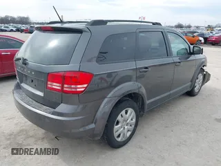 2017 Dodge Journey SE with VIN 3C4PDCABXHT694909, listed as a IAAI auction lot 41640828 with 188,657 mi miles and . Bid and sale history available at DreamBid. Image 4.