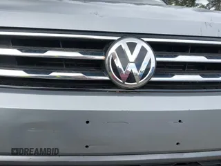 2021 Volkswagen Tiguan SE with VIN 3VV3B7AX0MM008809, listed as a IAAI auction lot 42077986 with 70,780 mi miles and . Bid and sale history available at DreamBid. Image 17.