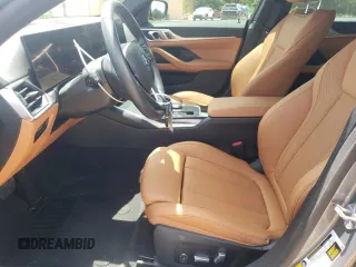 2023 BMW i4 eDrive40 with VIN WBY73AW08PFN75939, listed as a Copart auction lot 56928064 with 10,295 mi miles and Salvage Title. Bid and sale history available at carsss.com. Image 7.