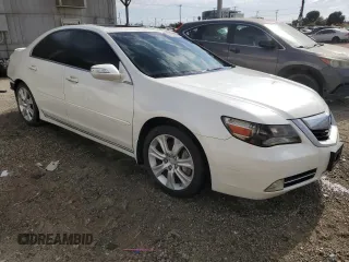 2009 Acura RL Tech Pkg with VIN JH4KB26659C001231, listed as a Copart auction lot 54249085 with 130,144 mi miles and Clean Title. Bid and sale history available at carsss.com. Image 4.