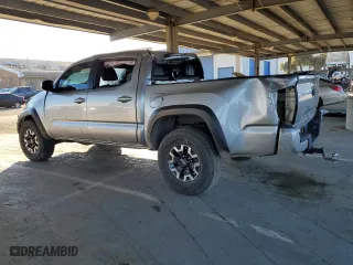 2023 Toyota Tacoma 4WD SR with VIN 3TMCZ5AN6PM612625, listed as a Copart auction lot 50152015 with 32,156 mi miles and Salvage Title. Bid and sale history available at carsss.com. Image 2.