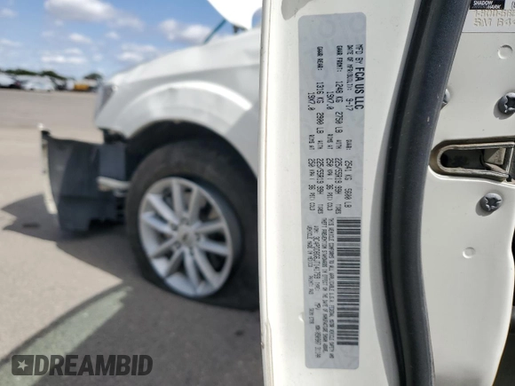 2018 Dodge Journey SXT with VIN 3C4PDDBG6JT141759, listed as a Copart auction lot 53974645 with 142,335 mi miles and Salvage title. Bid and sale history available at DreamBid. Image 13.
