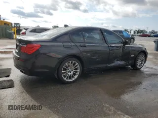 2011 BMW 7 Series 740i with VIN WBAKA4C52BC612977, listed as a Copart auction lot 52582575 with 157,813 mi miles and Salvage Title. Bid and sale history available at carsss.com. Image 3.