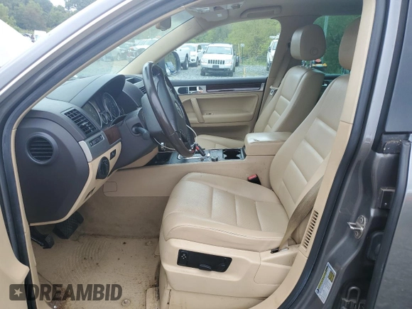 2010 Volkswagen Touareg VR6 with VIN WVGBF7A91AD001497, listed as a Copart auction lot 68234794 with 173,826 mi miles and Clean Title. Bid and sale history available at DreamBid. Image 7.