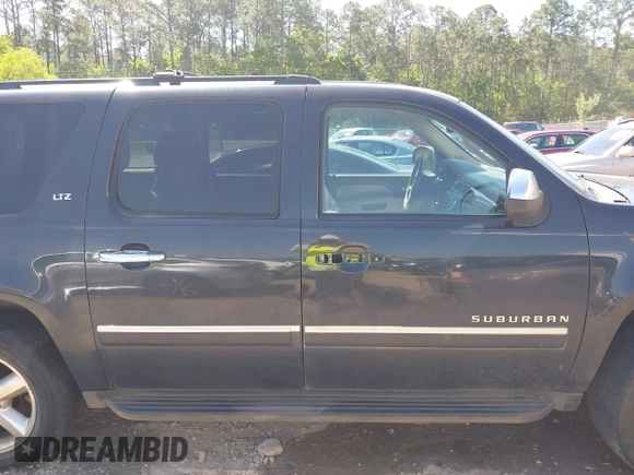 2011 Chevrolet Suburban LTZ with VIN 1GNSKKE31BR299912, listed as a IAAI auction lot 41990351 with 268,982 mi miles. Bid and sale history available at carsss.com. Image 13.