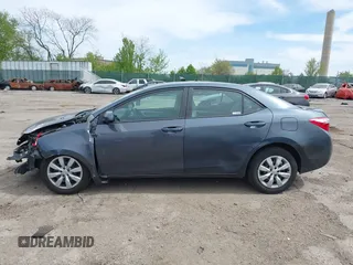 2015 Toyota Corolla L with VIN 2T1BURHE1FC381115, listed as a IAAI auction lot 42088980 with 203,493 mi miles and . Bid and sale history available at DreamBid. Image 13.