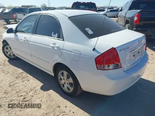 2009 Kia Spectra EX with VIN KNAFE222695588022, listed as a IAAI auction lot 42106609 with 153,688 mi miles. Bid and sale history available at carsss.com. Image 3.