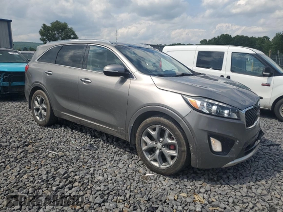 2016 Kia Sorento SX z VIN 5XYPKDA54GG031749, wystawiony jako Copart lot #59871035 z przebiegiem 284 115 mil mil oraz Szkoda całkowita • Salvage title. Historia ofert i sprzedaży dostępna na DreamBid. Obrazek 4.