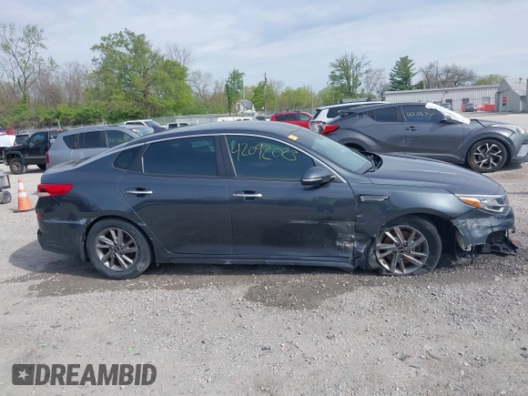 2020 Kia Optima LX with VIN 5XXGT4L3XLG399702, listed as a IAAI auction lot 42092023 with 70,861 mi miles and . Bid and sale history available at DreamBid. Image 14.