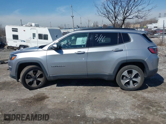 2017 Jeep Compass Latitude with VIN 3C4NJDBBXHT624119, listed as a IAAI auction lot 41827524 with 51,163 mi miles. Bid and sale history available at carsss.com. Image 14.