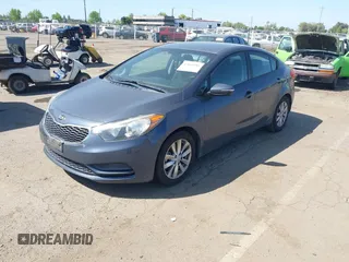 2015 Kia Forte LX with VIN KNAFX4A61F5354649, listed as a IAAI auction lot 42040586 with 113,436 mi miles. Bid and sale history available at carsss.com. Image 2.