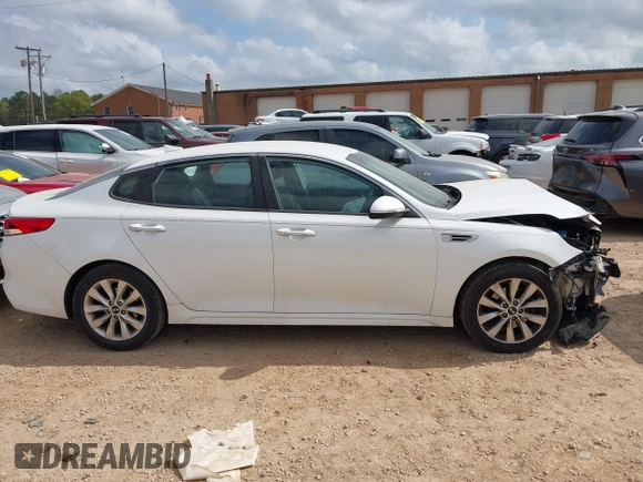 2017 Kia Optima LX z VIN 5XXGT4L39HG133028, wystawiony jako IAAI lot #41957226 z przebiegiem 92 366 mil mil oraz . Historia ofert i sprzedaży dostępna na DreamBid. Obrazek 13.