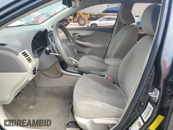 2010 Toyota Corolla with VIN 1NXBU4EE2AZ352883, listed as a Copart auction lot 63660205 with 131,039 mi miles and Salvage title. Bid and sale history available at DreamBid. Image 7.