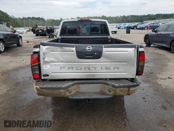 2004 Nissan Frontier XE with VIN 1N6DD26T54C460839, listed as a Copart auction lot 56355795 with 321,540 mi miles and Salvage title. Bid and sale history available at DreamBid. Image 6.
