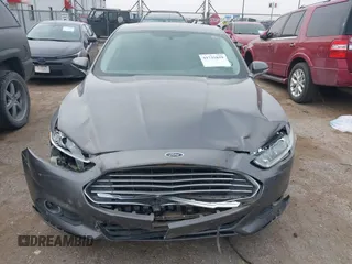 2014 Ford Fusion SE with VIN 1FA6P0HD4E5387312, listed as a IAAI auction lot 41735859 with 152,805 mi miles and . Bid and sale history available at DreamBid. Image 12.