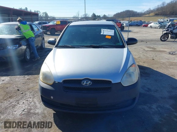 2007 Hyundai Accent GS with VIN KMHCM36C97U043769, listed as a IAAI auction lot 41526011 with 230,566 mi miles. Bid and sale history available at carsss.com. Image 12.