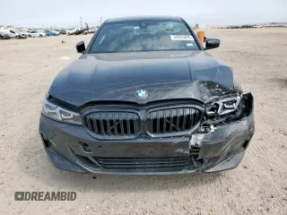 2023 BMW 3 Series 330i with VIN 3MW69FF08P8D30427, listed as a Copart auction lot 58085895 with 27,608 mi miles and Salvage title. Bid and sale history available at DreamBid. Image 5.