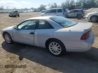 1997 Chrysler Sebring LXi z VIN 4C3AU52NXVE180034, wystawiony jako Copart lot #73413994 z przebiegiem 123 637 mil mil oraz Tytuł czysty. Historia ofert i sprzedaży dostępna na DreamBid. Obrazek 2.