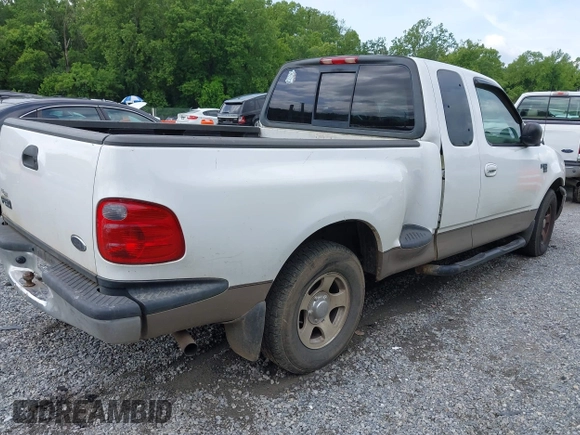 2003 Ford F-150 XL with VIN 1FTRX07WX3KD86058, listed as a IAAI auction lot 42502946 with Not provided miles and . Bid and sale history available at DreamBid. Image 4.