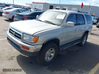 1998 Toyota 4Runner SR5 with VIN JT3HN86R5W0192618, listed as a IAAI auction lot 41643377 with 107,006 mi miles. Bid and sale history available at carsss.com. Image 2.