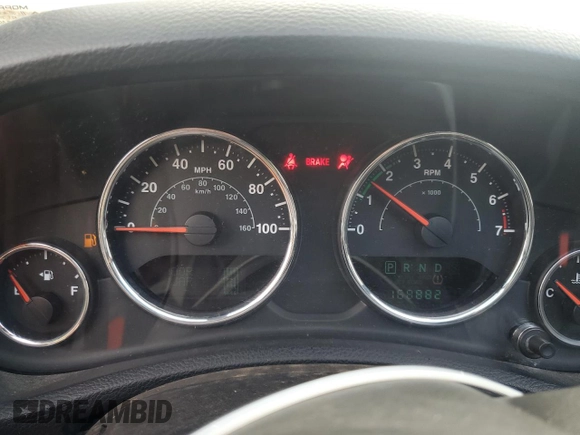 2012 Jeep Wrangler Unlimited Sport z VIN 1C4BJWDG3CL181596, wystawiony jako Copart lot #57940655 z przebiegiem 168 882 mil mil oraz Czysty tytuł • Clean title. Historia ofert i sprzedaży dostępna na DreamBid. Obrazek 9.