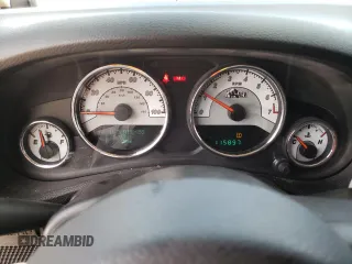 2013 Jeep Wrangler Unlimited Rubicon 10th Anniversary with VIN 1C4HJWFGXDL543660, listed as a Copart auction lot 61462104 with 115,897 mi miles and Salvage title. Bid and sale history available at DreamBid. Image 9.