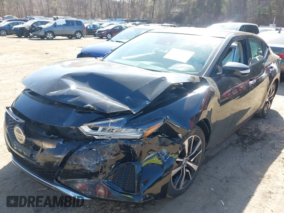 2021 Nissan Maxima SV with VIN 1N4AA6CV1MC513733, listed as a IAAI auction lot 41804923 with 75,570 mi miles and . Bid and sale history available at DreamBid. Image 2.
