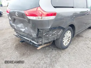 2014 Toyota Sienna XLE with VIN 5TDYK3DC0ES436502, listed as a IAAI auction lot 42180990 with 154,839 mi miles and . Bid and sale history available at DreamBid. Image 18.