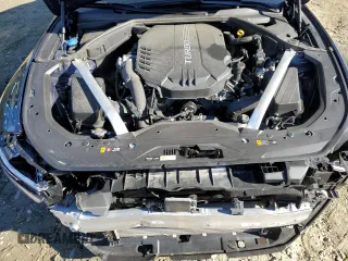 2023 Genesis G70 3.3T with VIN KMTG54TE9PU110984, listed as a Copart auction lot 79218944 with 16,702 mi miles and Salvage title. Bid and sale history available at DreamBid. Image 11.
