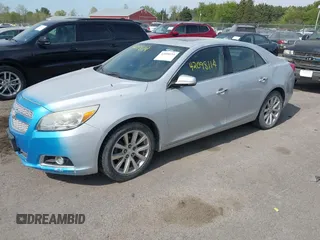 2013 Chevrolet Malibu LTZ with VIN 1G11H5SA3DF248223, listed as a IAAI auction lot 42098114 with 186,131 mi miles and . Bid and sale history available at DreamBid. Image 2.